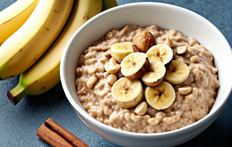 Oatmeal with banana, peanut butter, and cinnamon. (Image of a bowl of oatmeal topped with sliced banana, a dollop of peanut butter, and a sprinkle of cinnamon)